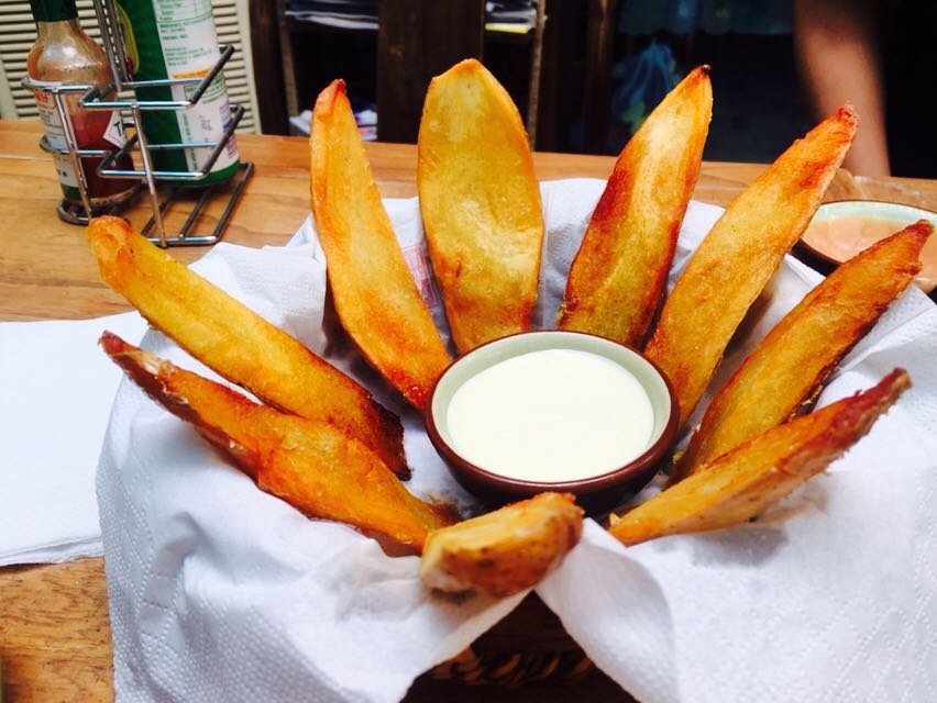 Crispy jacket potato skins with garlic dip