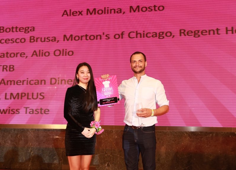 Alex Molina accepts his award at the March 7 Reader Restaurant Awards ceremony