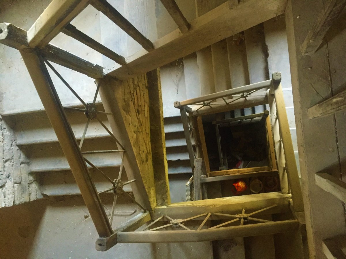 The school's halls and staircases lie empty, void of the children that used to study here