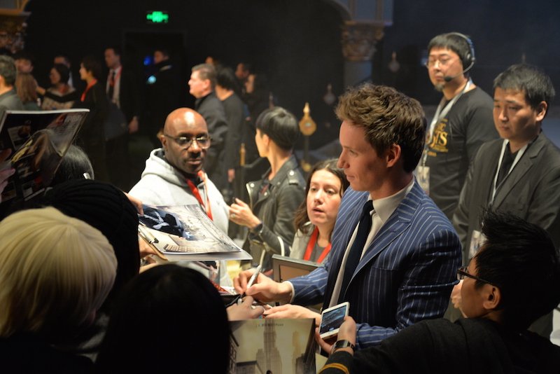 Redmayne signs autographs at the event