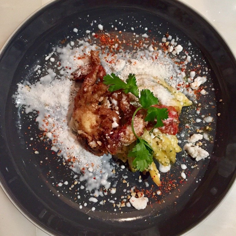 "Taste": tempura soft shell crab with spicy peach salad and mango lassi "snow"