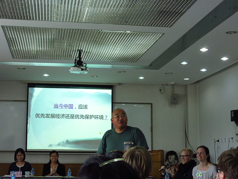 Hua laoshi leads the class in discussions