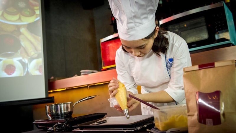 Jia hired several talented chefs such as Qiu Jue (pictured) to work at her La Vie Simple bakery