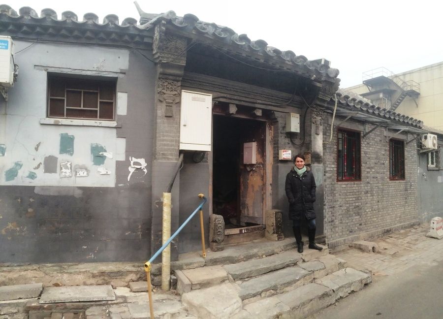 Rosie Levine stands outside one of her favorite siheyuan on Wudaoying Hutong