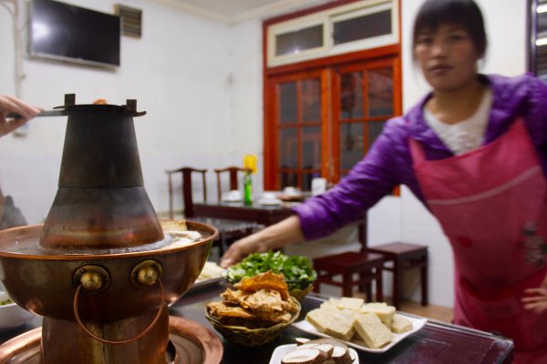 Learn the history of Mongolian hotpot hotpot food tour with Untour Beijing