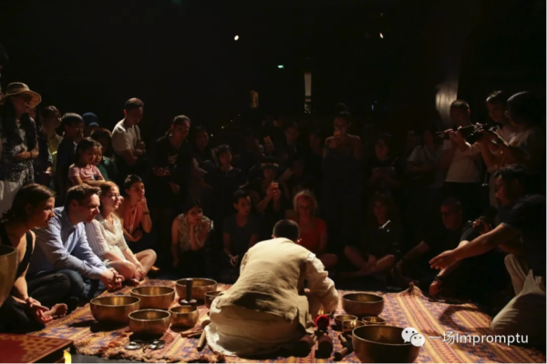 Xu Chang performing Himalayan Bowl Therapy