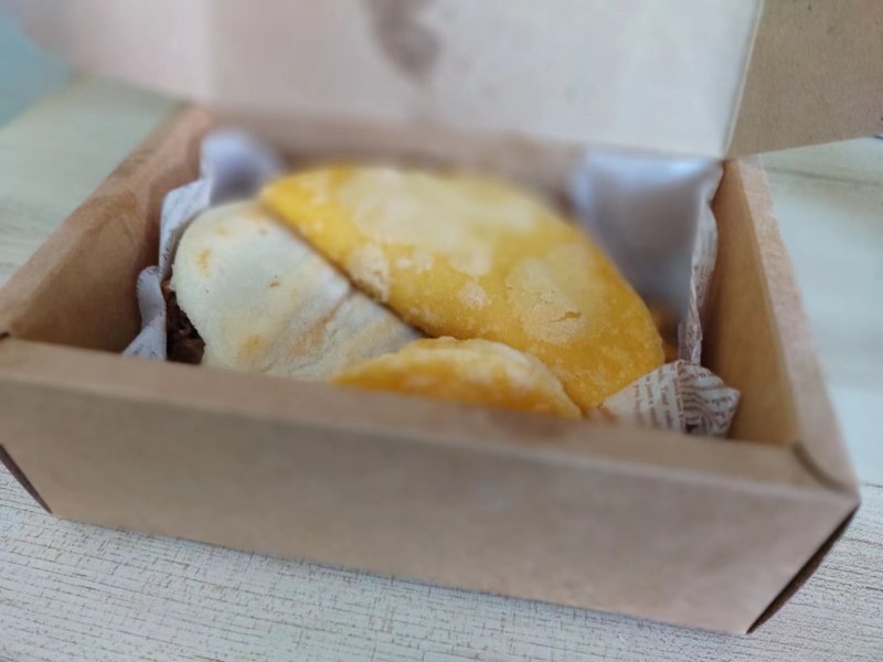 Arepas come packaged up with empanadas and andinitos