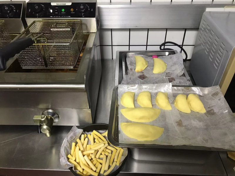 Empanadas and corn fries prepped for cooking