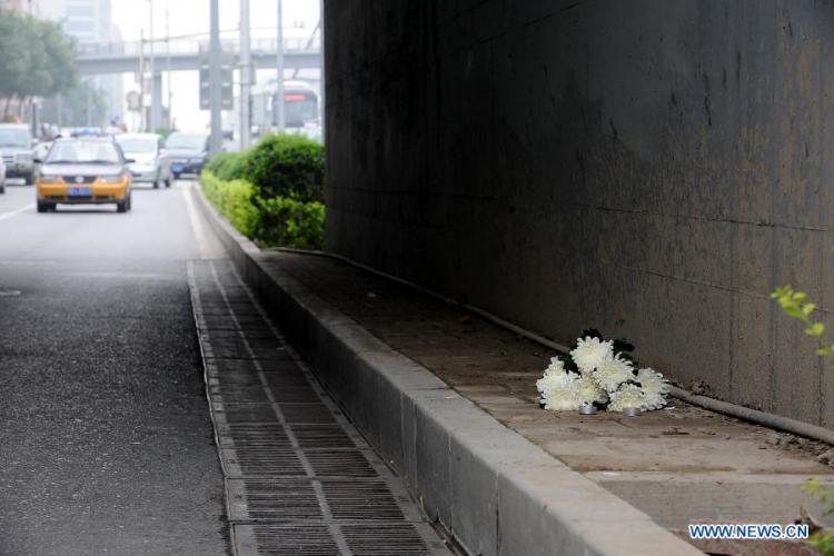 Suspect Kills Two on Guangqumen Bridge Over Weekend