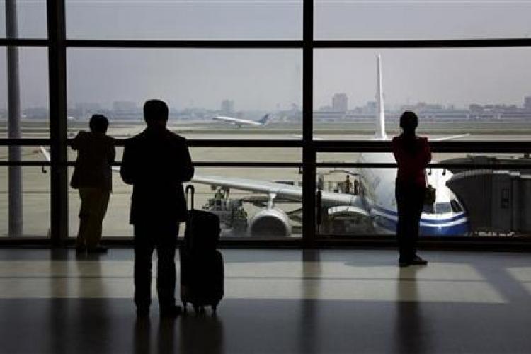 Customs Official: 200 Foreigners Deported from Beijing in 2013