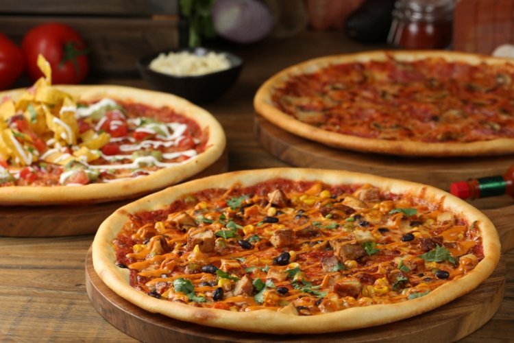 In Pizza We Crust: Q Mex&#039;s South-of-the-Border Pizza Twist Proves a Spicy Hit
