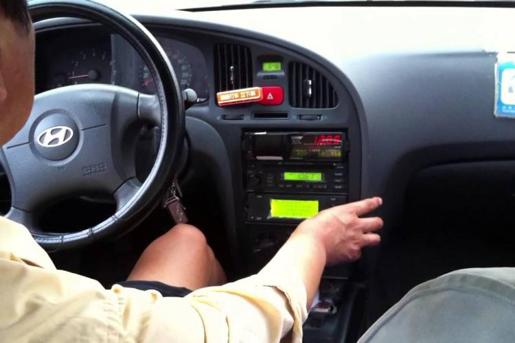 Peking Man: Chain Smoking Cab Driver Complains About Pollution