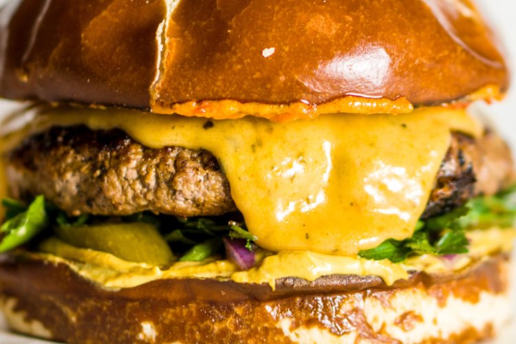 Make That a Double Cheese Burger: On the Joys of Coagulated Animal Milk