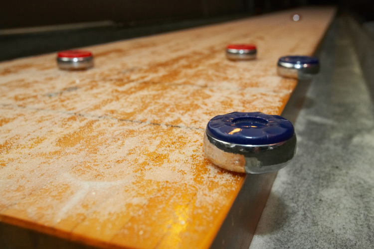 A Handful of Bars To Play Table Shuffleboard in the Capital
