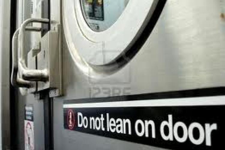 Don’t Lean Against the Subway Door