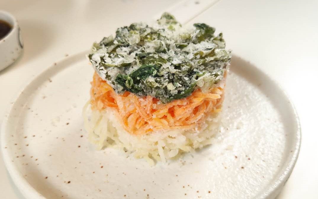 The steamed vegetable cake add a little color to the mix