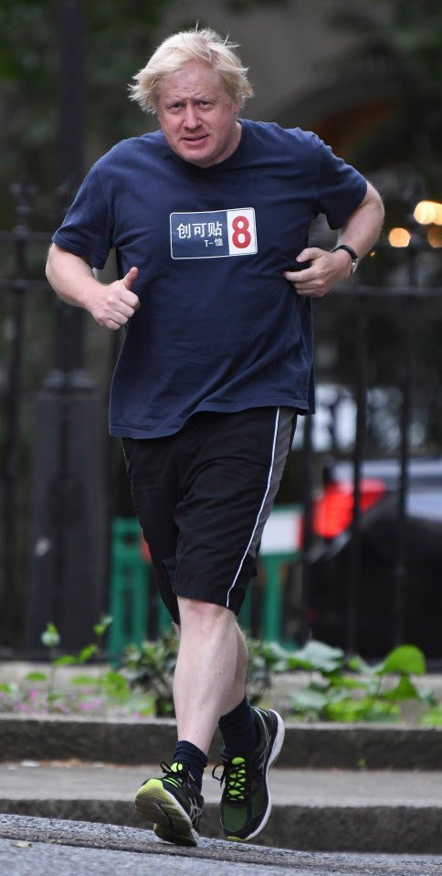 British Prime Minister Boris Johnson goes for a jog in his favorite Plastered 8 shirt