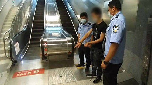 A perpetrator is apprehended in a Beijing subway station earlier this year