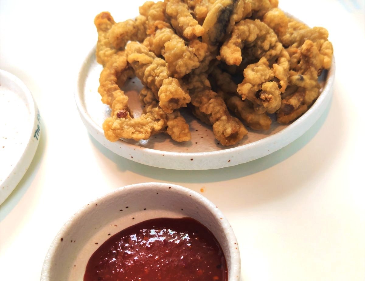 The pork strips come breaded, fried, and ready to dip