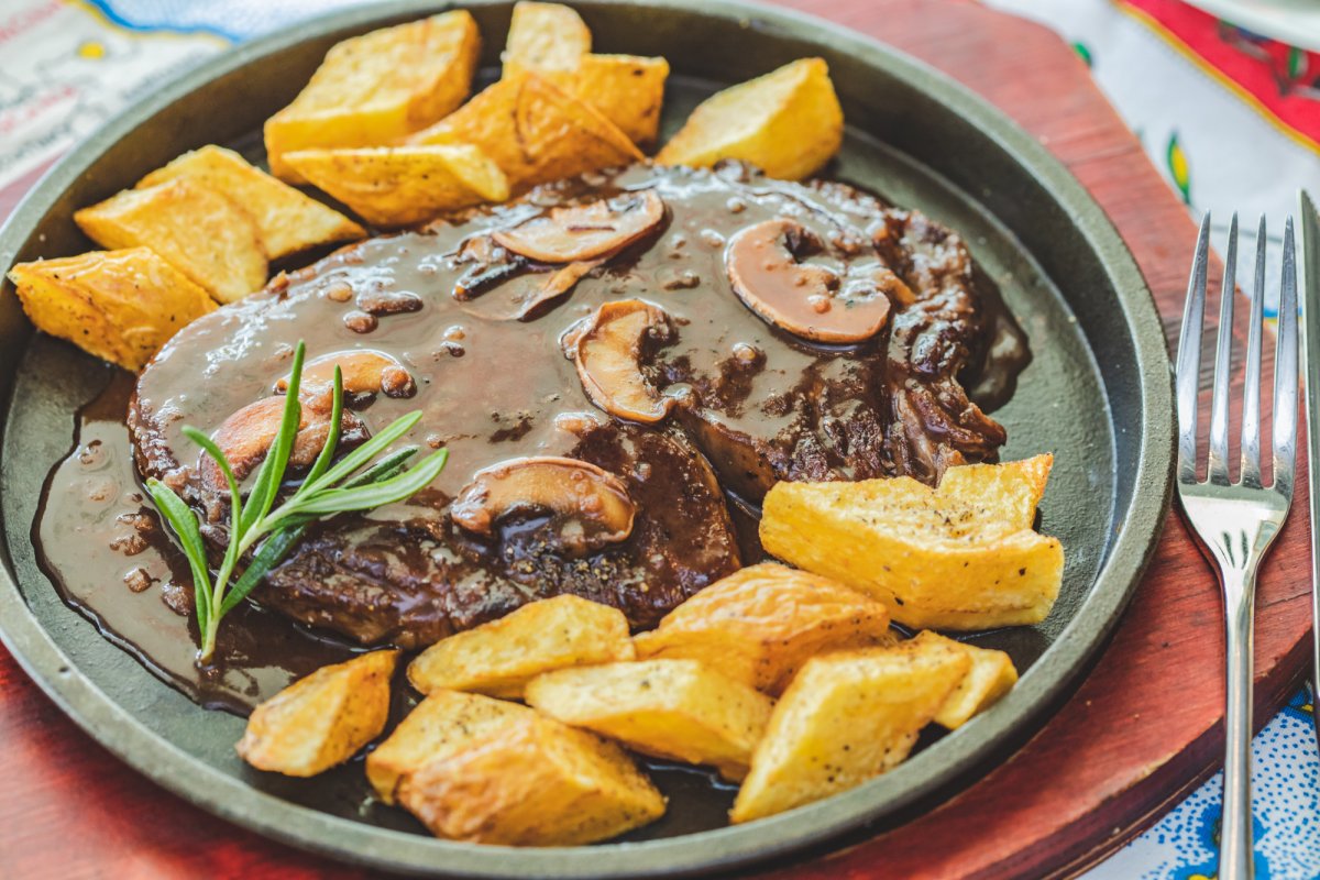 The owner is proud of this steak's special sauce