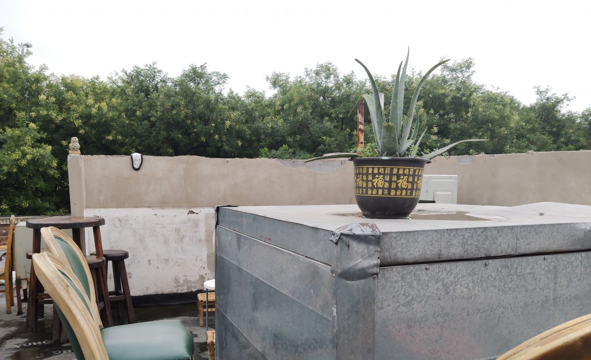 The makeshift seating adds a bit of character to the rooftop