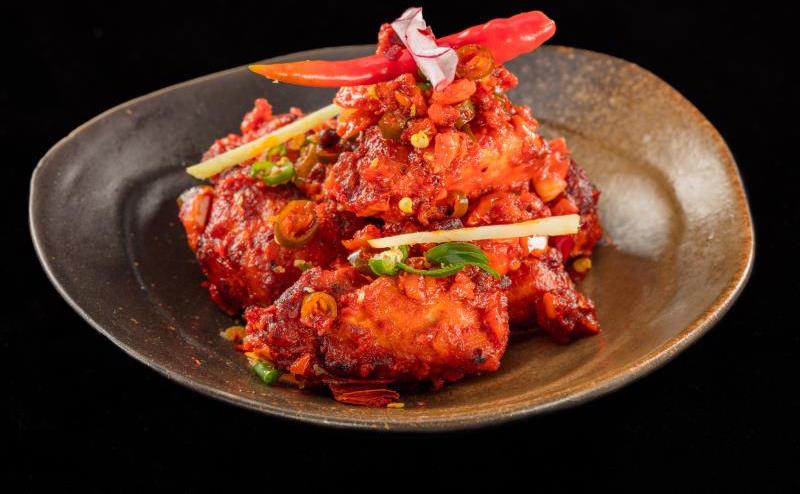 DP: Feel the Burn: Test Your Spice-Tolerance with Punjabi&#039;s Fiery Indian Treats